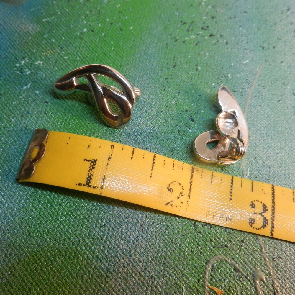 VTG Monet silver clip earrings swirly looped knots silver tone dressy studs glam - Picture 7 of 9